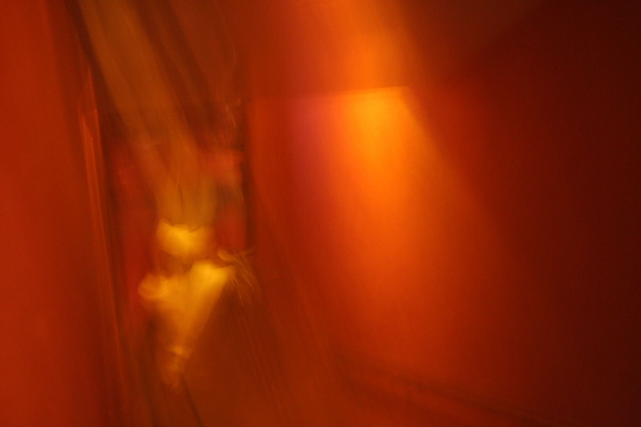 Abstract photo of the dimly lit stairway at Oasis Lounge in Vancouver's West End, 2009.
